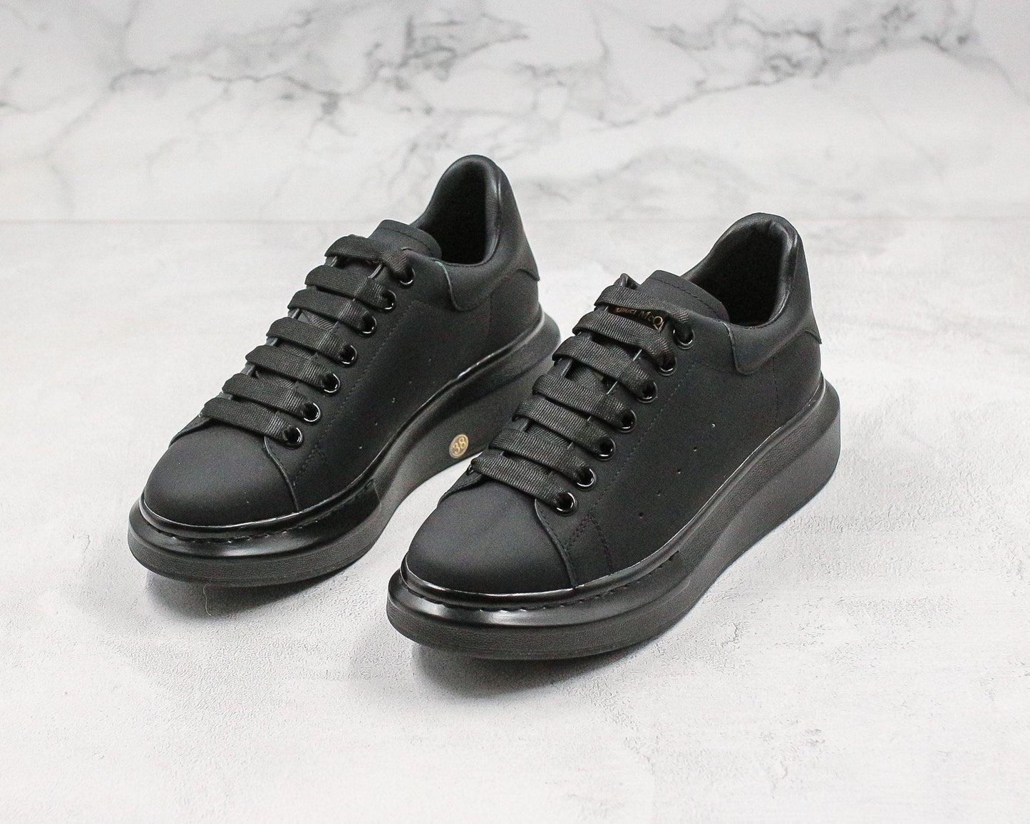 ALEXANDER MCQUEEN OVERSIZED SNEAKER